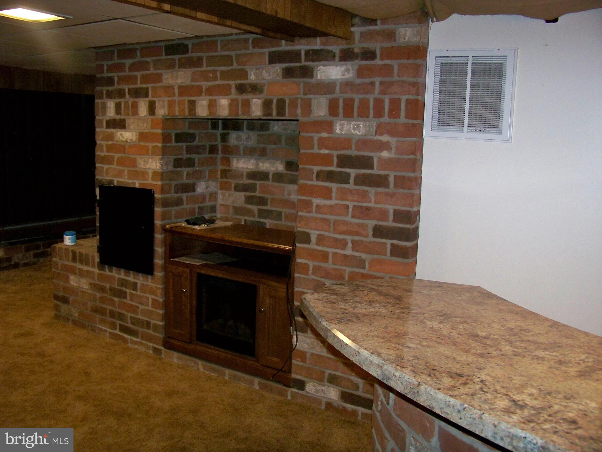 627 Truce Road New Providence, PA 17560 - Photo 28 of 32 TV cabinet w/ electric fireplace