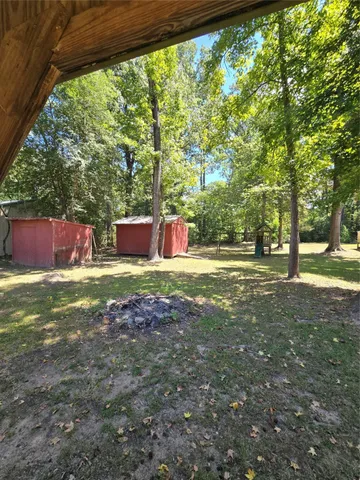 a view of house with outdoor space