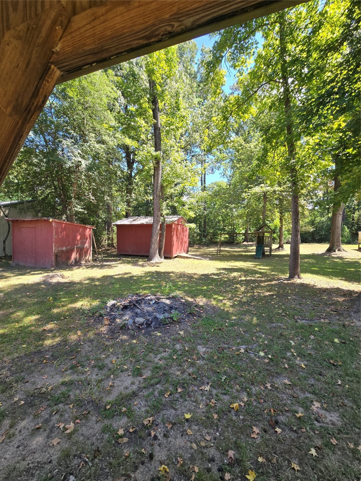 206 Tallow Street Onalaska, TX 77360 - Photo 14 of 25 a front view of a house with a yard