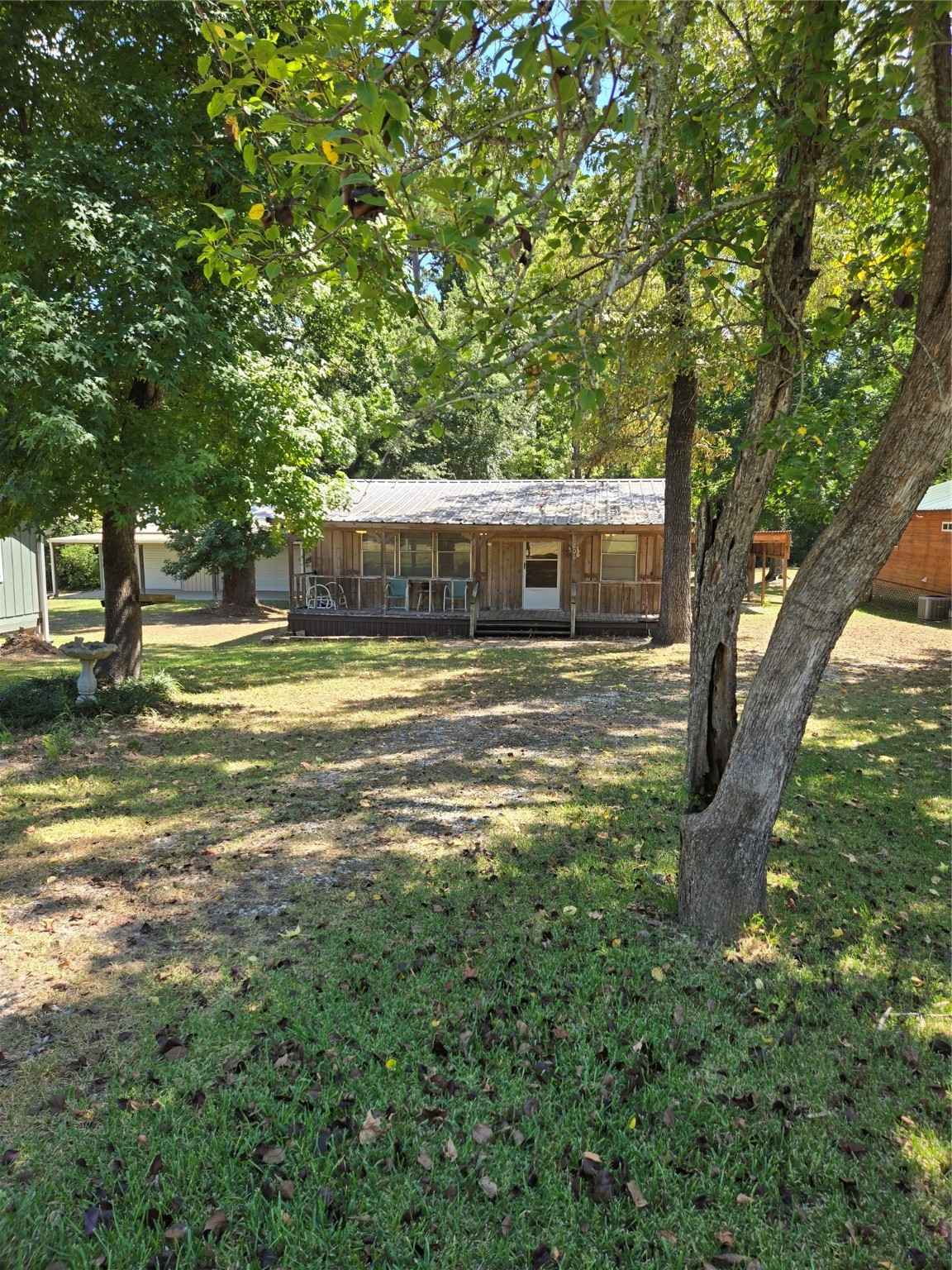 206 Tallow Street Onalaska, TX 77360 - Photo 3 of 25 a view of a house with a yard
