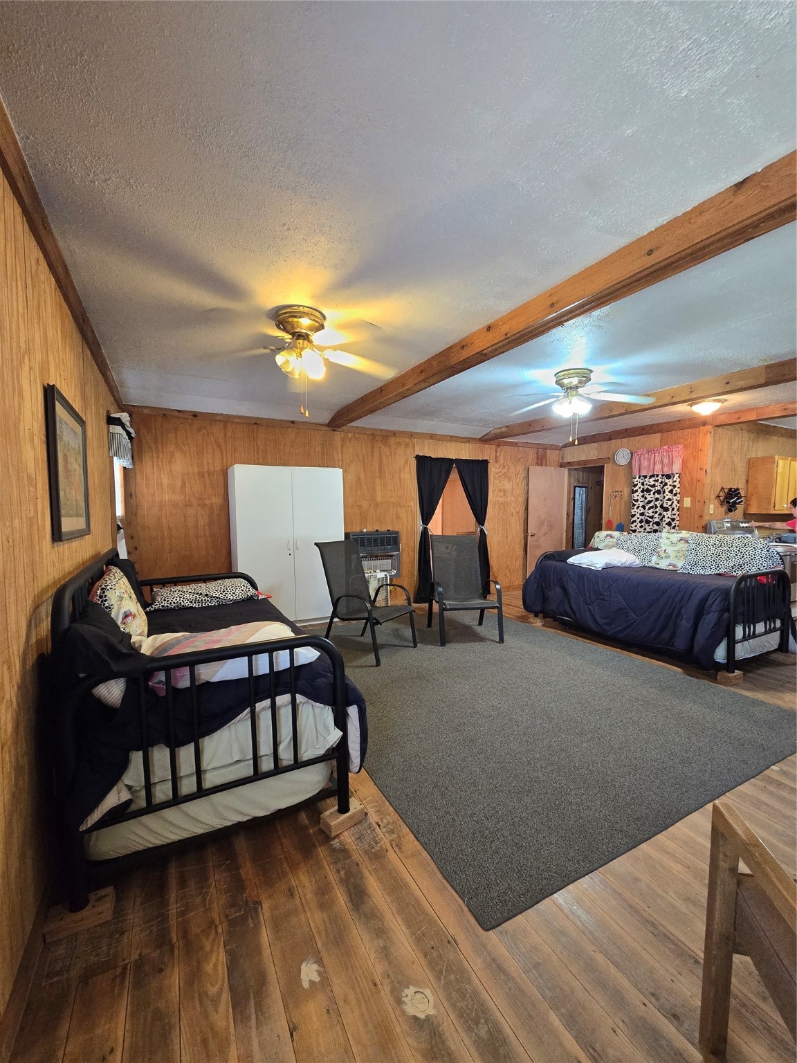 206 Tallow Street Onalaska, TX 77360 - Photo 9 of 25 a bedroom with furniture and window