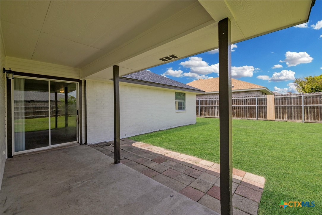 214 Timber Ridge Drive Nolanville, TX 76559 - Photo 25 of 31 a view of a house with backyard and porch