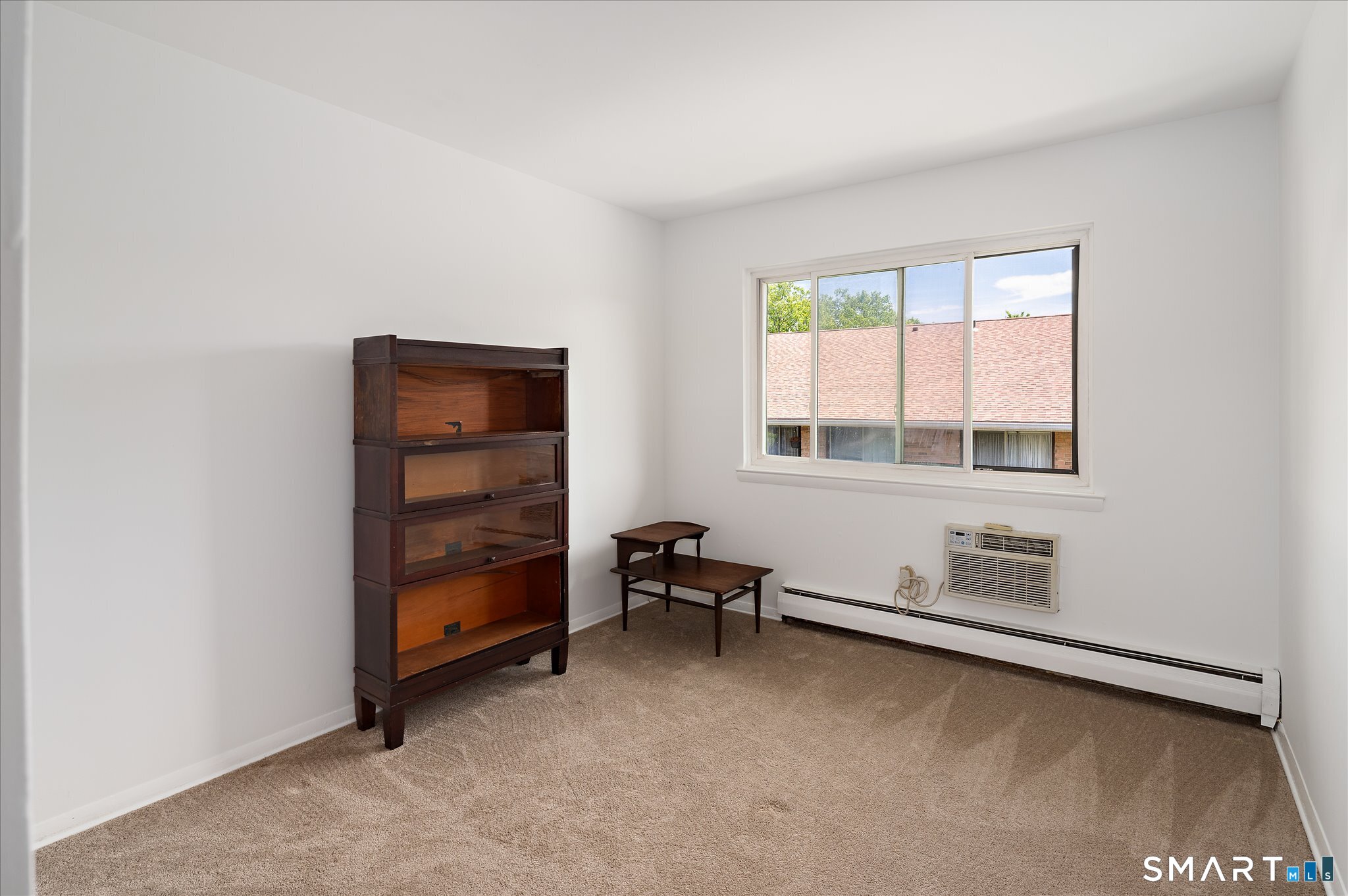 154 Cold Spring Road, Unit 23 Stamford, CT 06905 - Photo 18 of 34 A second light and bright guest bedroom