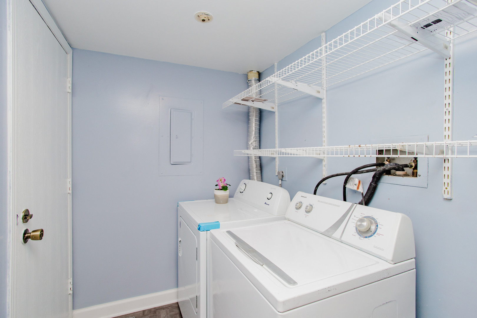 1215 Chalet Road, Unit 101 Naperville, IL 60563 - Photo 19 of 36 a utility room with dryer and washer