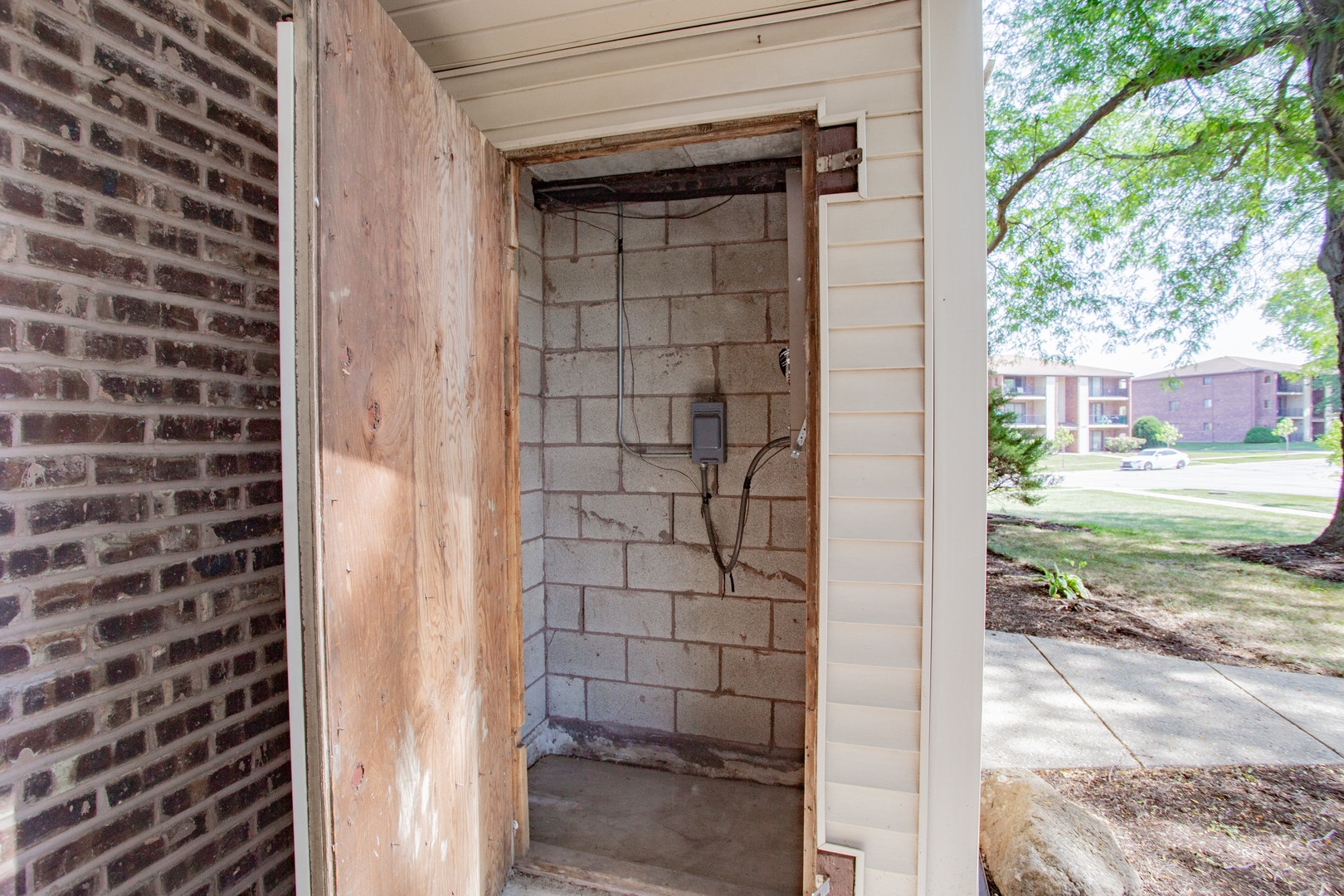 1215 Chalet Road, Unit 101 Naperville, IL 60563 - Photo 21 of 36 a view of a door and a window