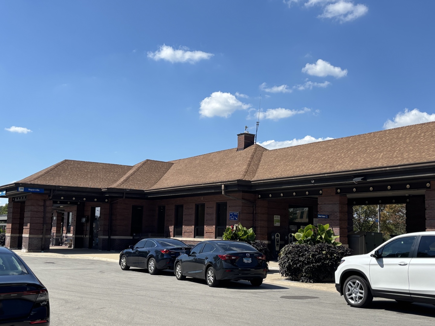 1215 Chalet Road, Unit 101 Naperville, IL 60563 - Photo 31 of 36 a car parked in front of a house