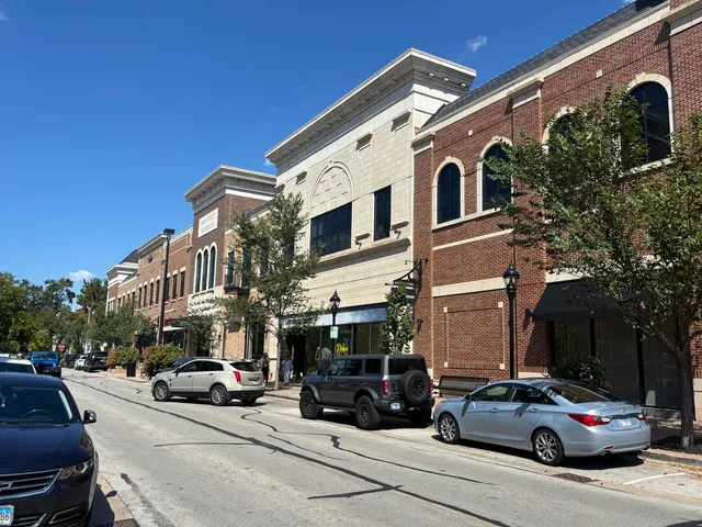 a view of a building and a street