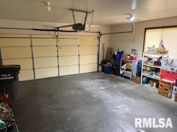 a view of a garage with storage