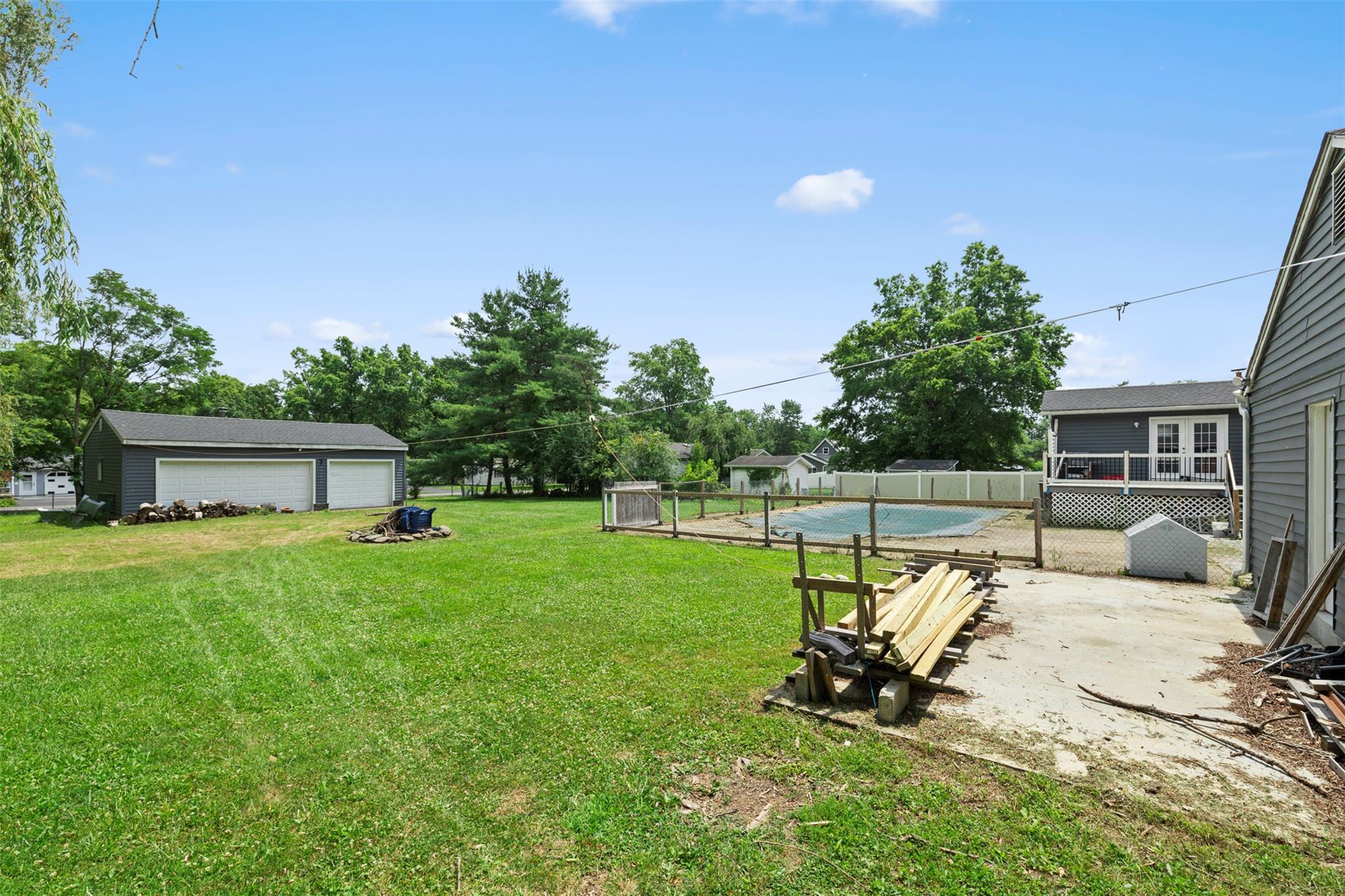 44 Woods Road Tivoli, NY 12583 - Photo 20 of 25 a view of a backyard with a sitting area and garden