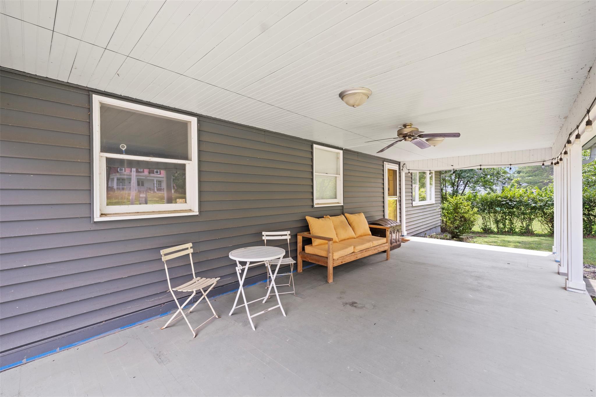 44 Woods Road Tivoli, NY 12583 - Photo 2 of 25 a backyard of a house with yard and outdoor seating