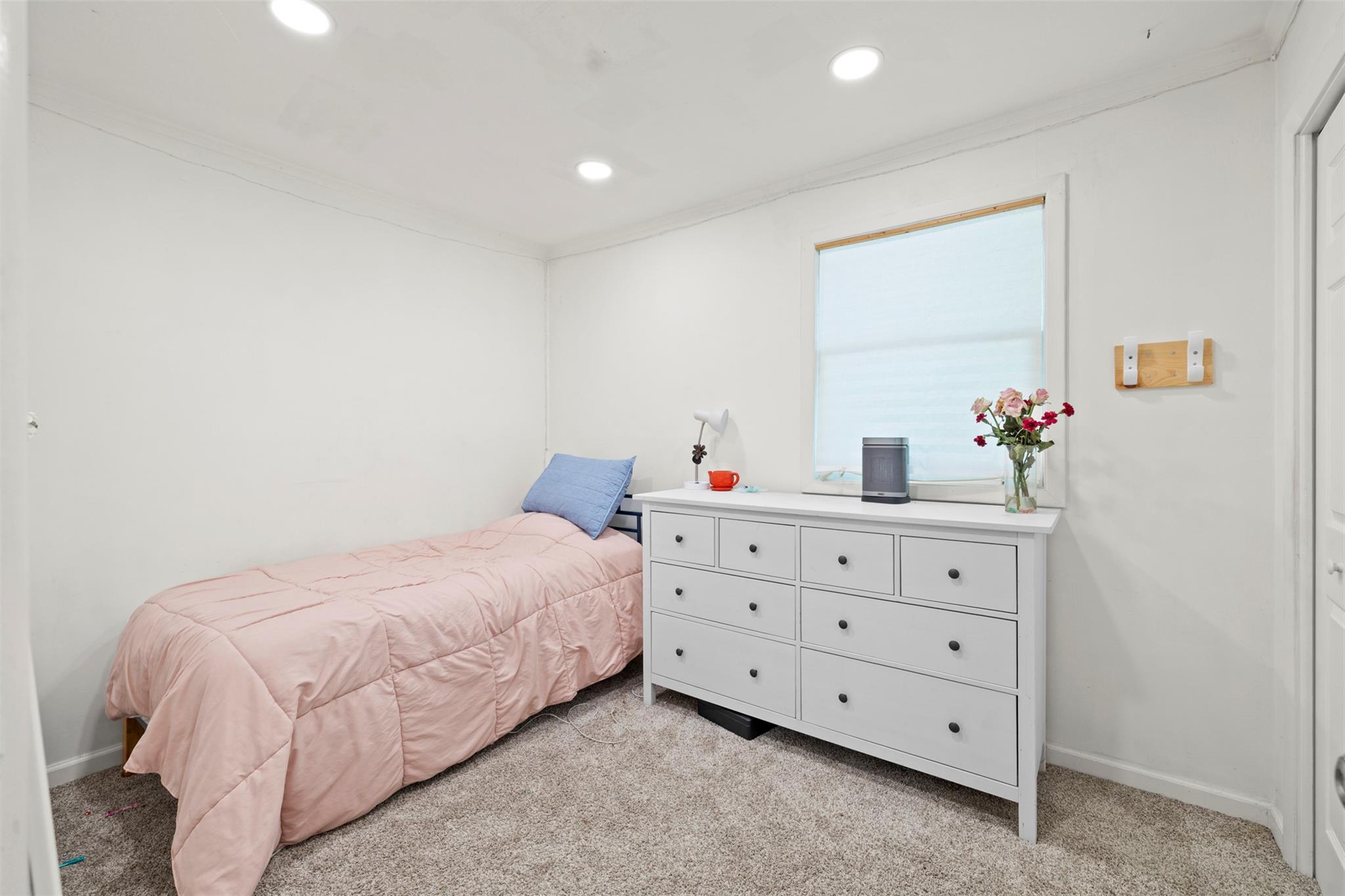 44 Woods Road Tivoli, NY 12583 - Photo 9 of 25 a bedroom with a bed and a dresser