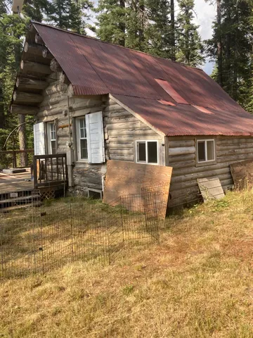 a view of yard with patio