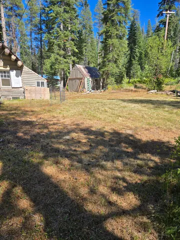 a view of a yard with an outdoor space