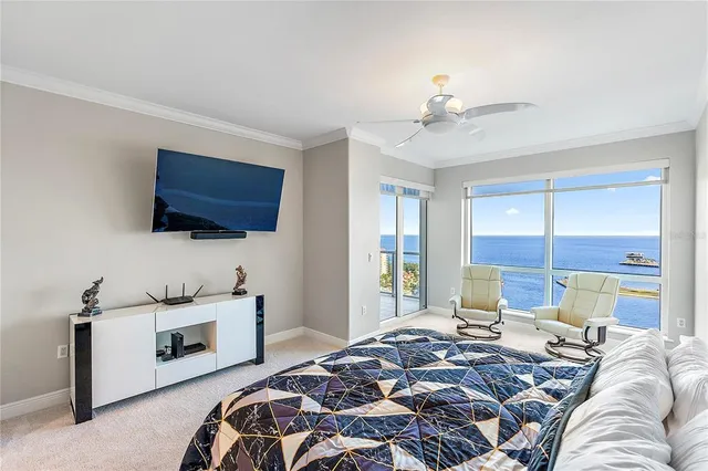 a bathroom with a glass shower door and a glass door