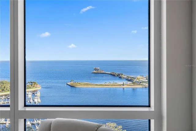 a bathroom with a toilet a sink and a mirror