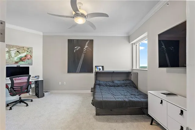 a bathroom with a shower and a glass door