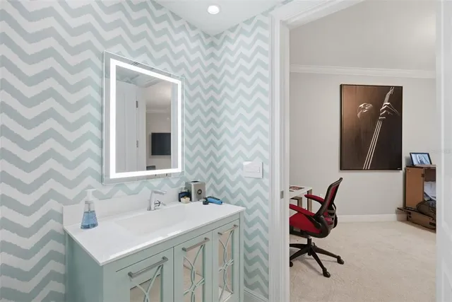 a view of a dining room with furniture and window