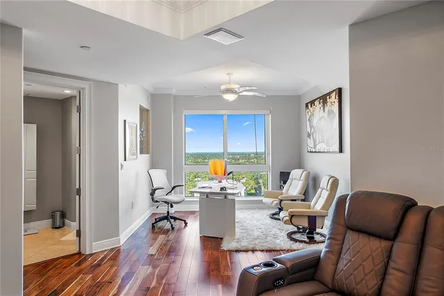 an aerial view of multiple houses with yard