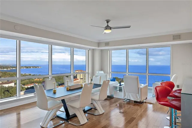 a living room with furniture or couch and a large window
