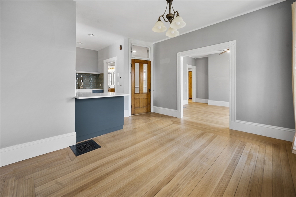 43 Robinson Street, Unit 3 Boston, MA 02122 - Photo 10 of 42 a view of a kitchen with wooden floor and a sink