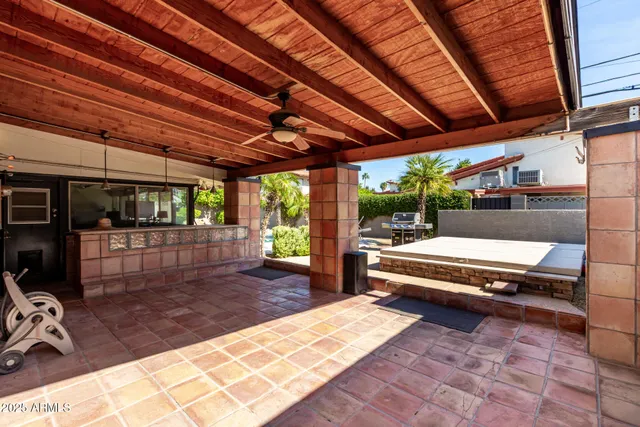a view of a house with porch and sitting area