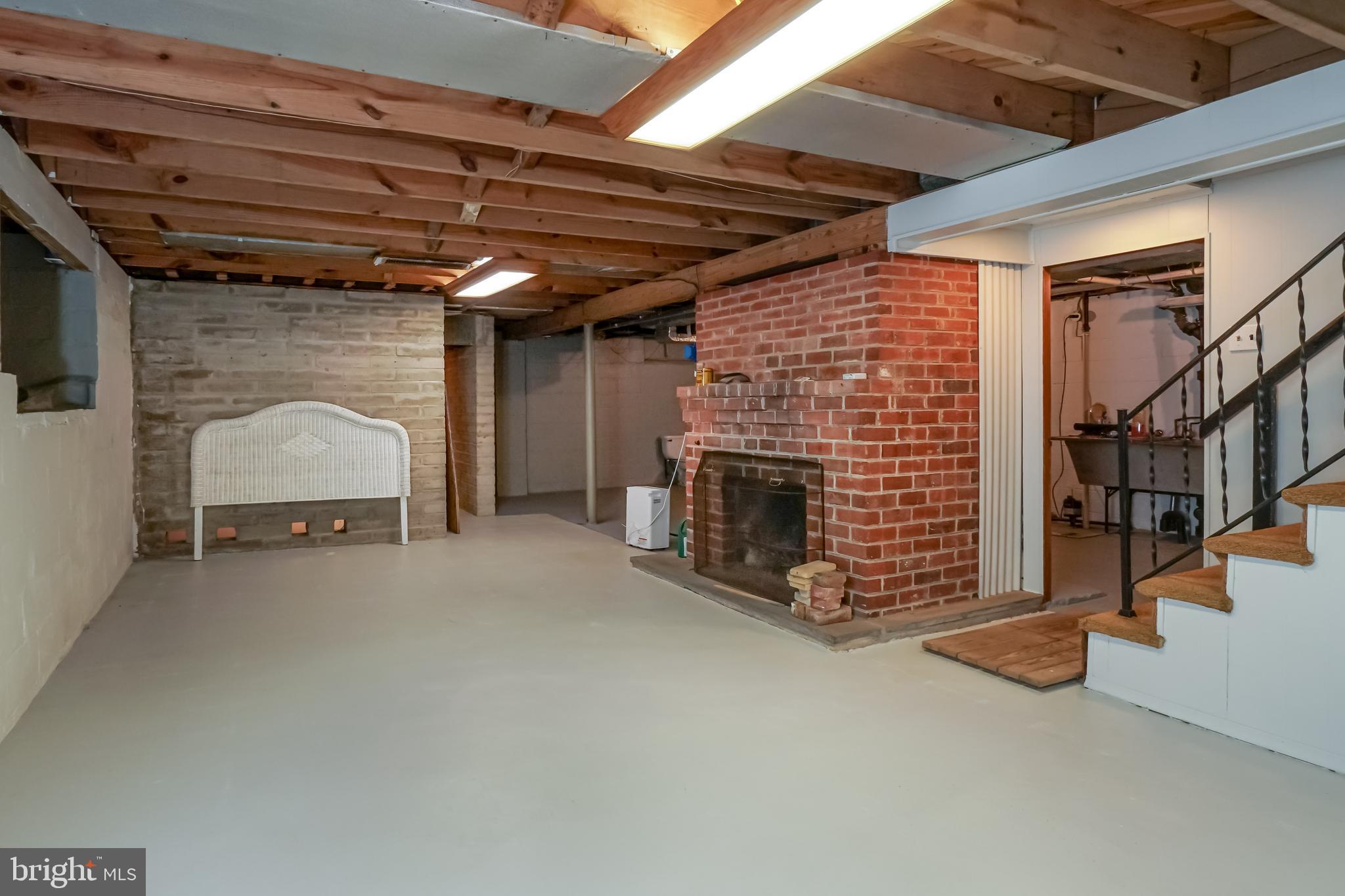 2604 Duncan Road Wilmington, DE 19808 - Photo 29 of 34 Full Basement with Brick Fireplace