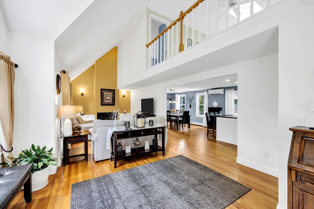 19 Drew Lane Mashpee, MA 02649 - Photo 11 of 42 a living room with furniture and wooden floor