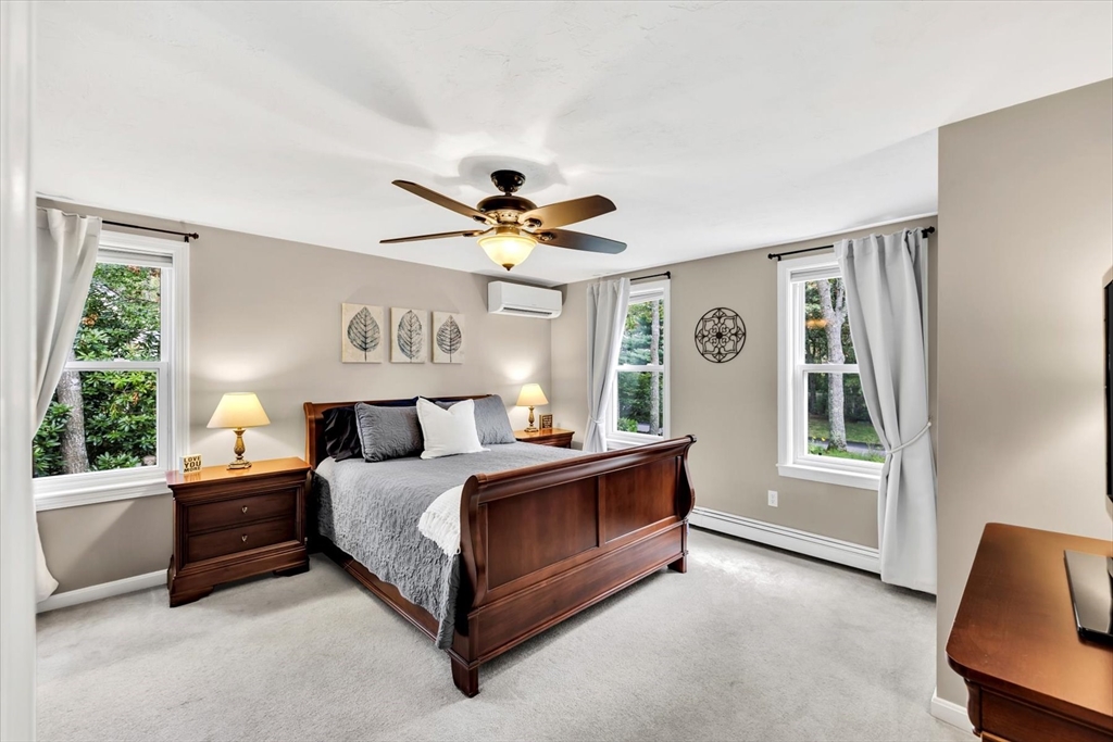 19 Drew Lane Mashpee, MA 02649 - Photo 23 of 42 a bed room with a bed and a window