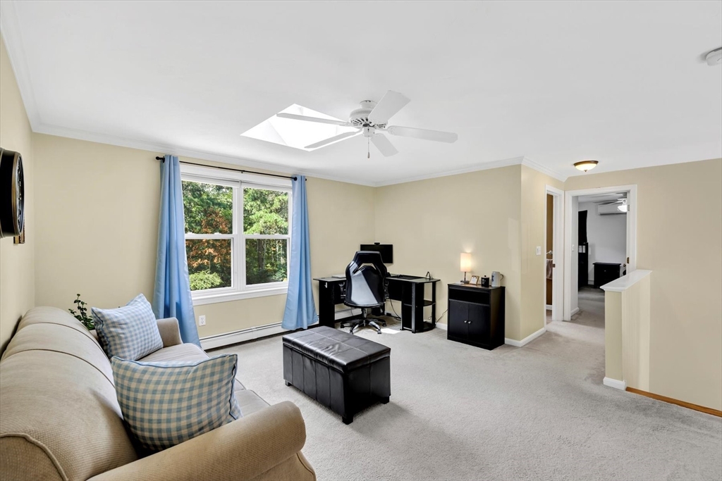 19 Drew Lane Mashpee, MA 02649 - Photo 29 of 42 a living room with furniture and a window
