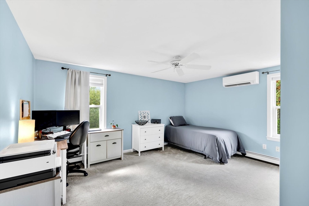 19 Drew Lane Mashpee, MA 02649 - Photo 30 of 42 a room with a bed and a window