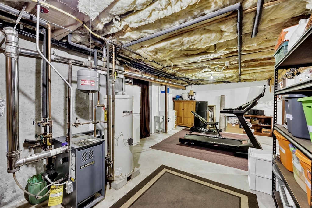 19 Drew Lane Mashpee, MA 02649 - Photo 41 of 42 a view of a room with gym equipment