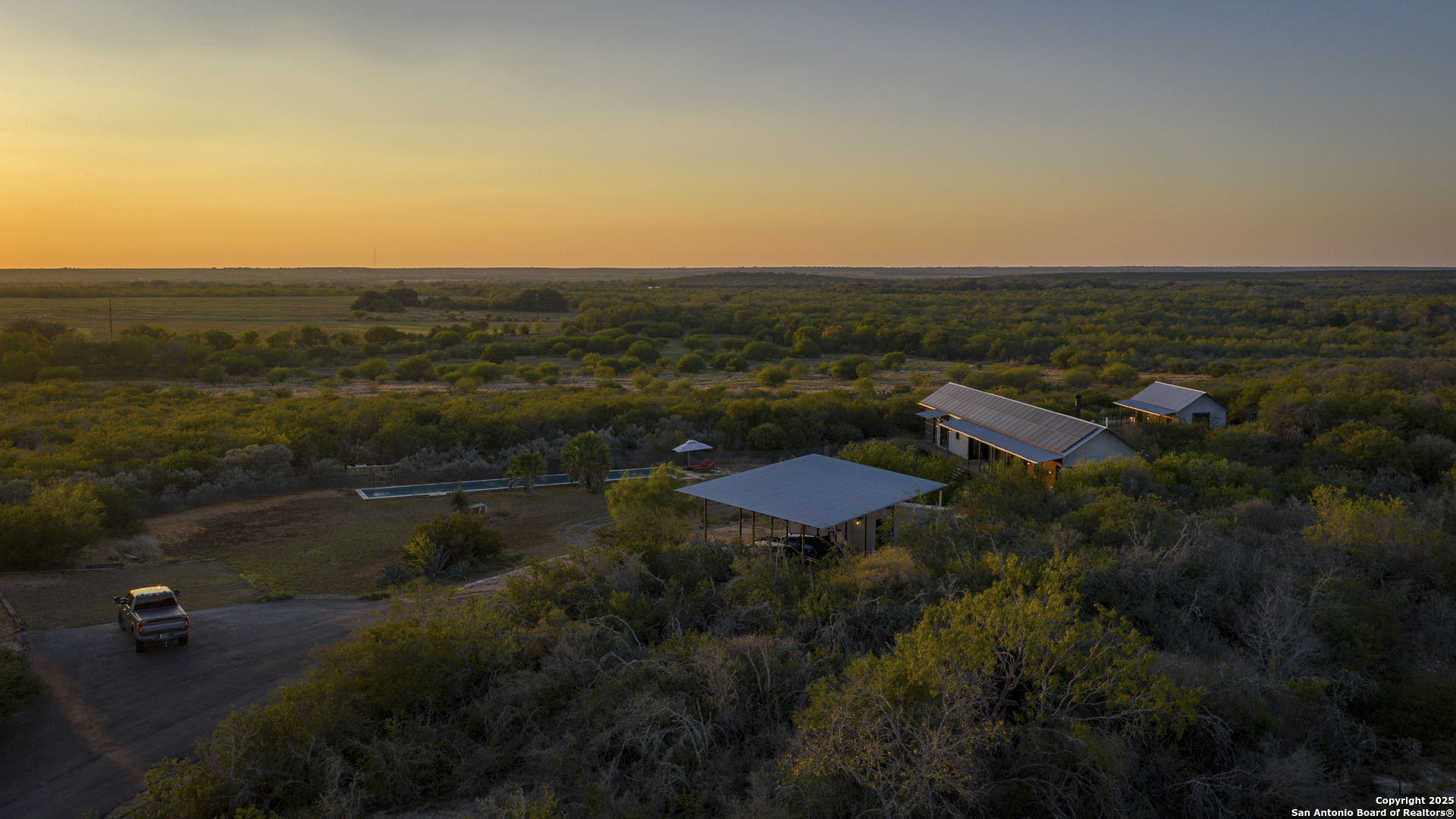 514 County Road 669 Devine, TX 78016 - Photo 11 of 45 an aerial view of residential house with outdoor space