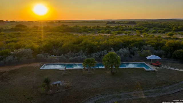 an outdoor view of house with ocean view