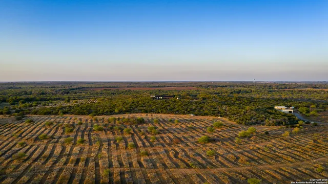 a view of a field with an outdoor space