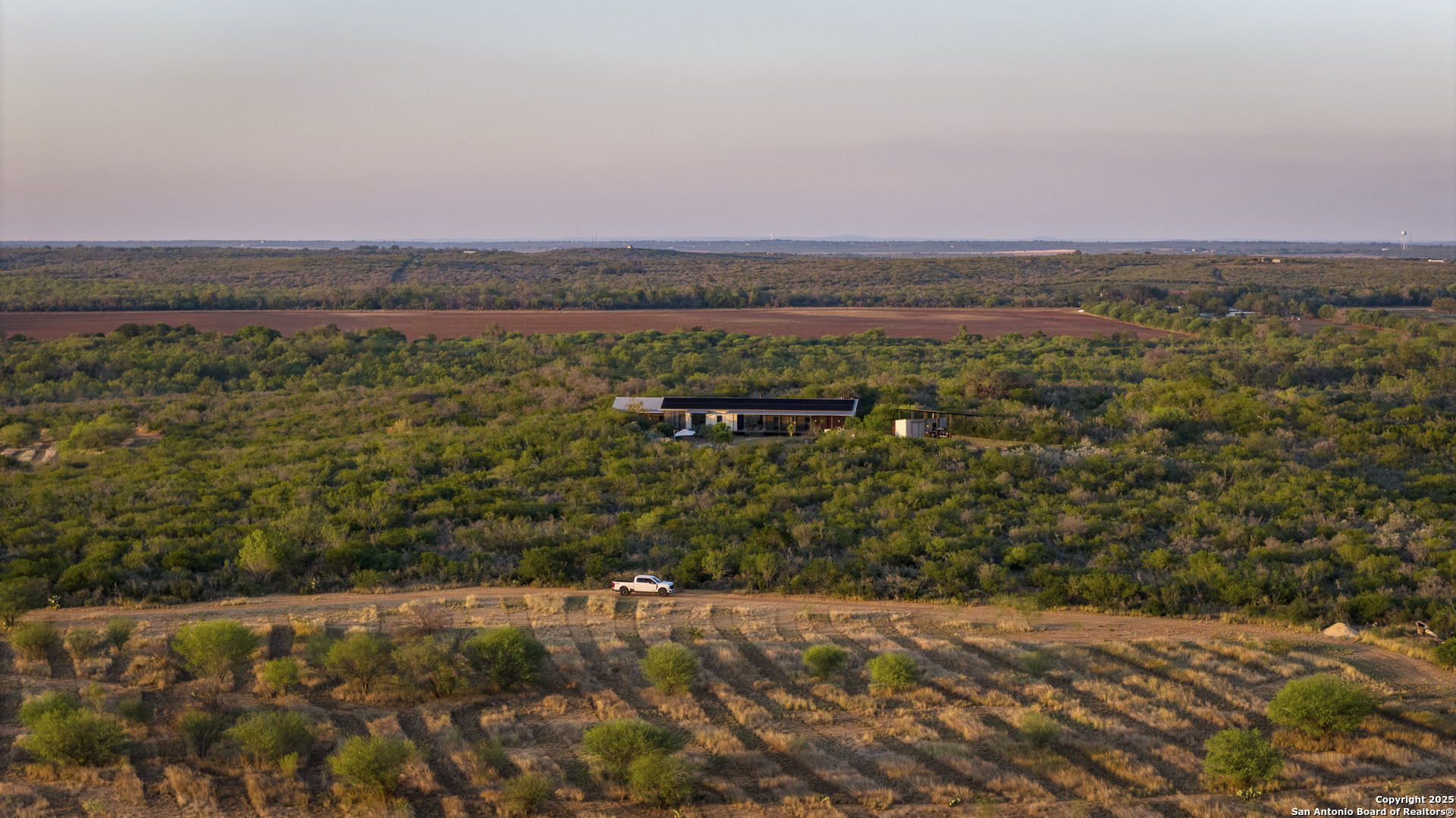 514 County Road 669 Devine, TX 78016 - Photo 14 of 45 a view of a field with an outdoor space