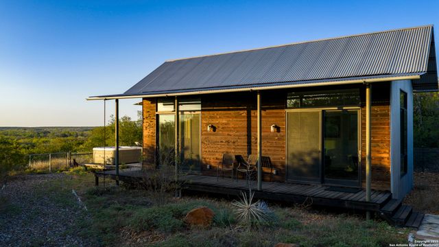 a view of swimming pool with a patio