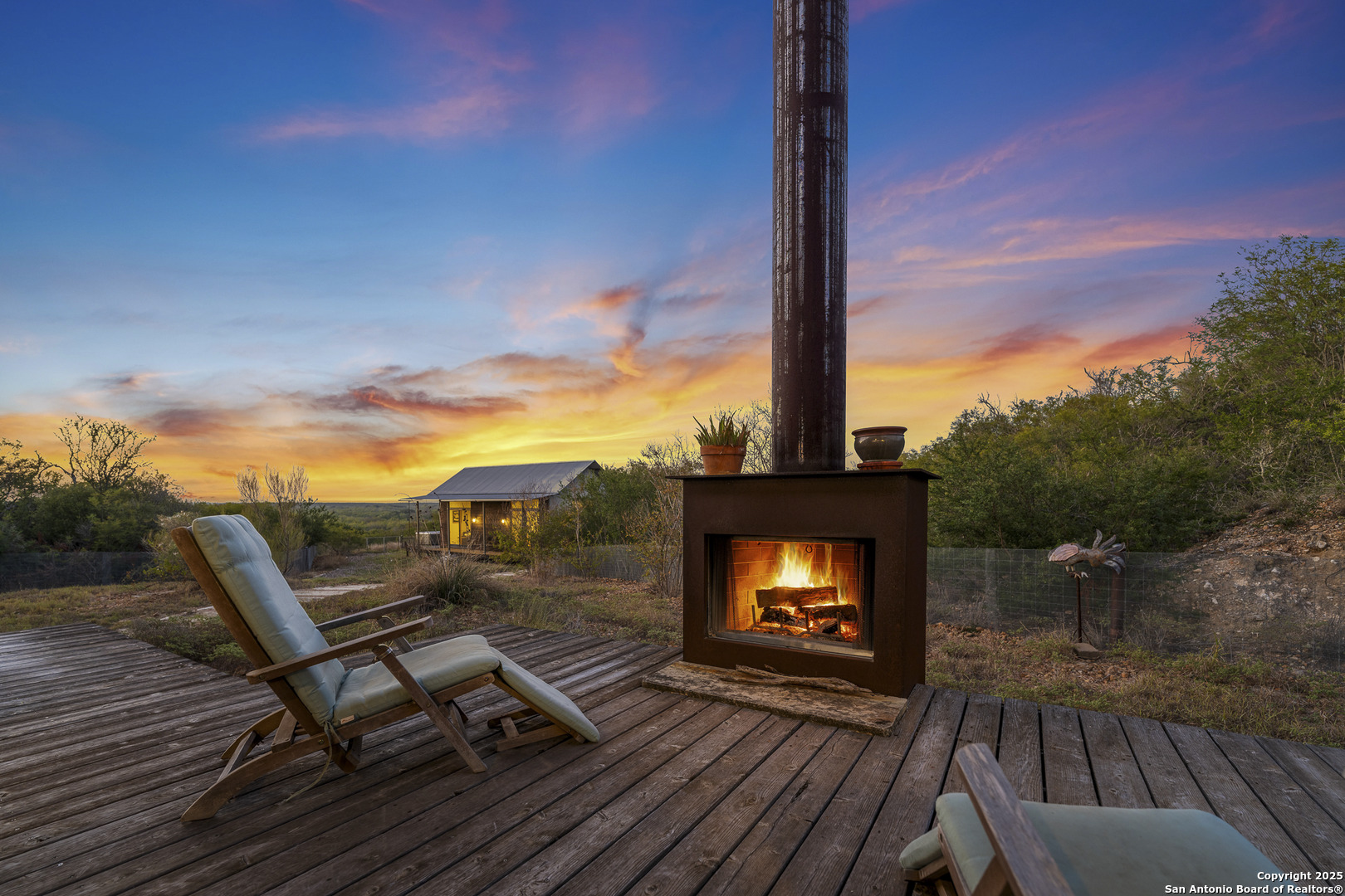 514 County Road 669 Devine, TX 78016 - Photo 28 of 45 a view of a chairs with an outdoor space