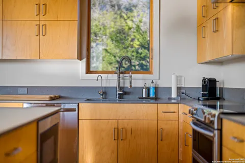 a view of a swimming pool with an outdoor space and seating area
