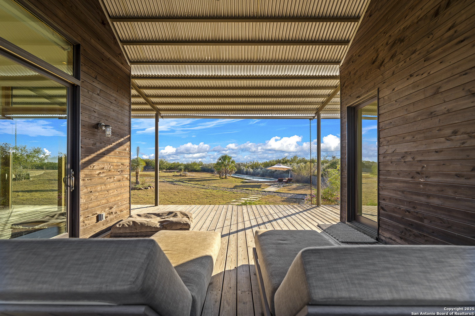 514 County Road 669 Devine, TX 78016 - Photo 35 of 45 a view of balcony with couch