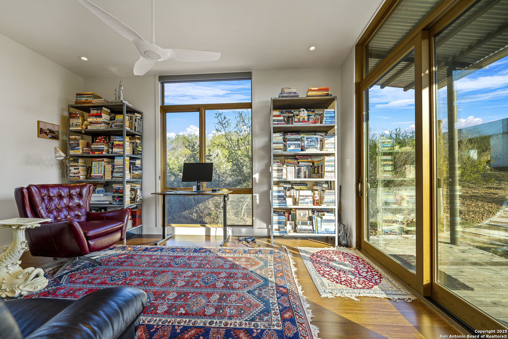 514 County Road 669 Devine, TX 78016 - Photo 37 of 45 a bedroom with a bed and large window