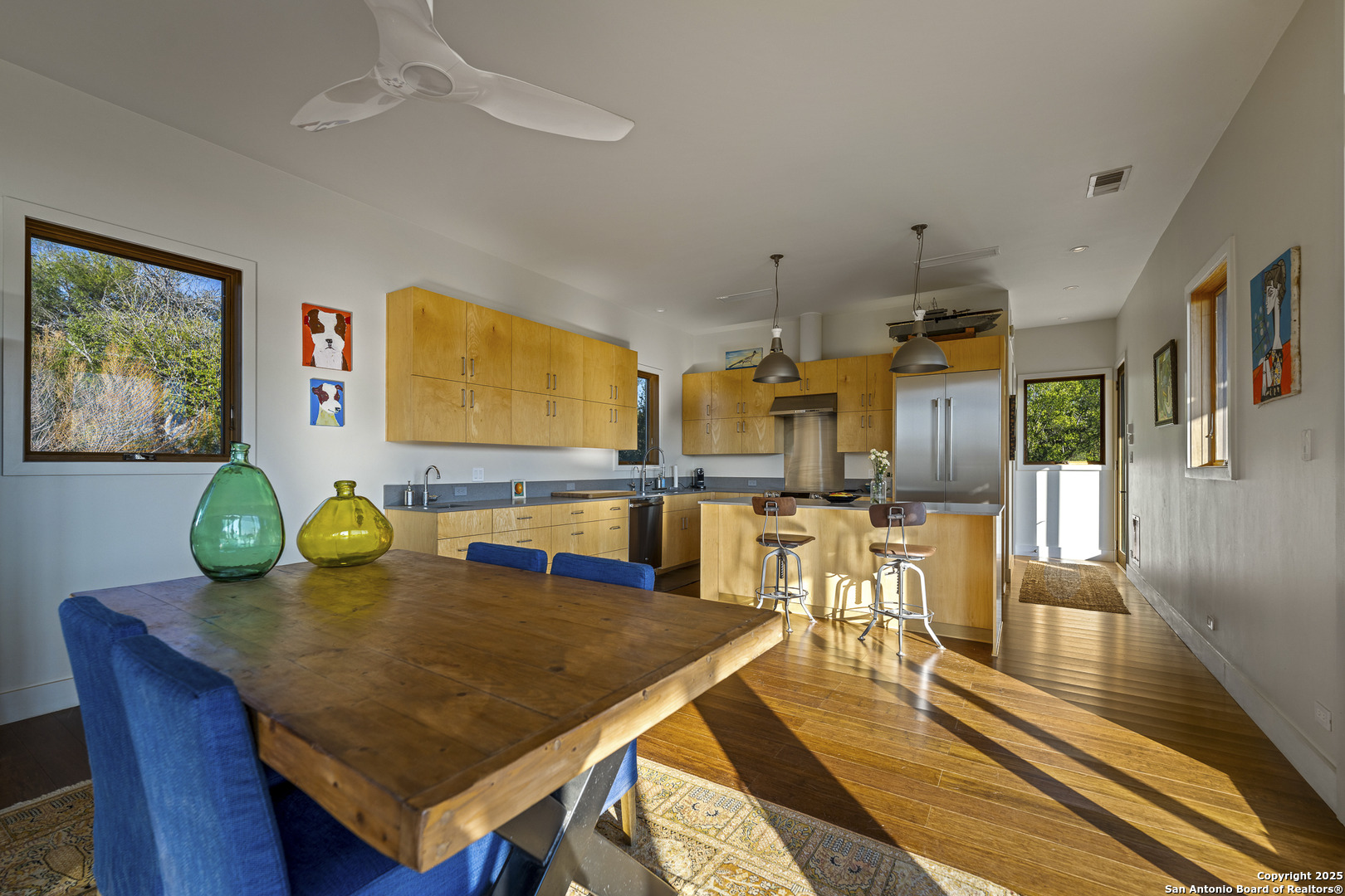514 County Road 669 Devine, TX 78016 - Photo 41 of 45 a view of a dining room with furniture and wooden floor