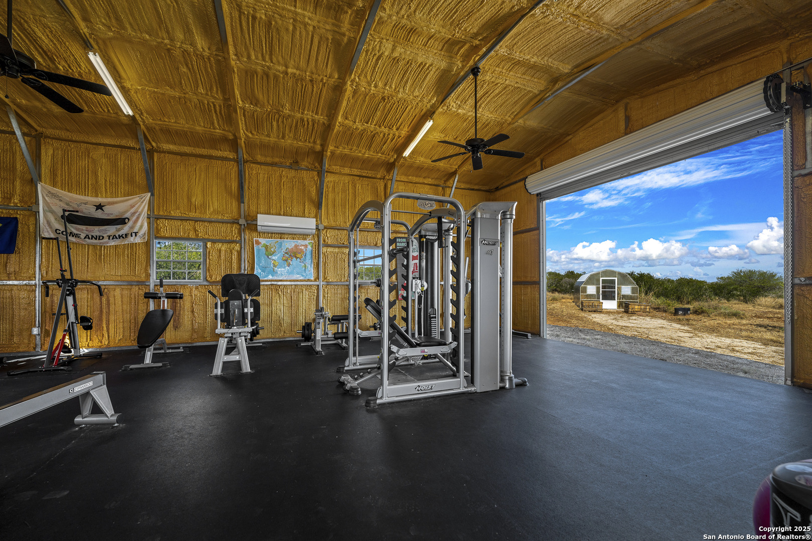 514 County Road 669 Devine, TX 78016 - Photo 44 of 45 a view of a room with gym equipment
