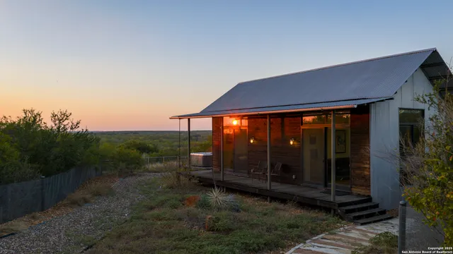 a view of a city with lush green forest