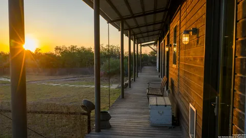 an aerial view of residential house with outdoor space