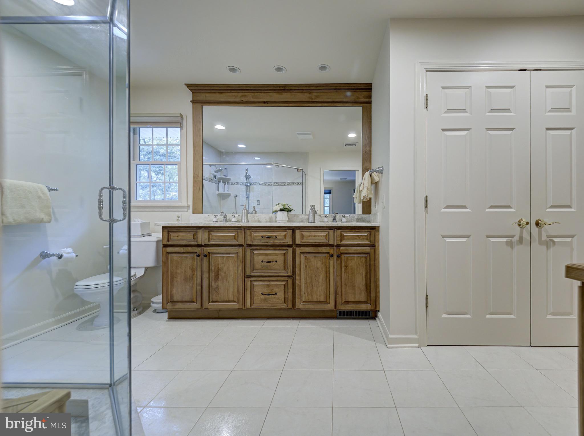 1 Craig Road Annandale, NJ 08801 - Photo 35 of 61 a bathroom with a sink a vanity and a mirror