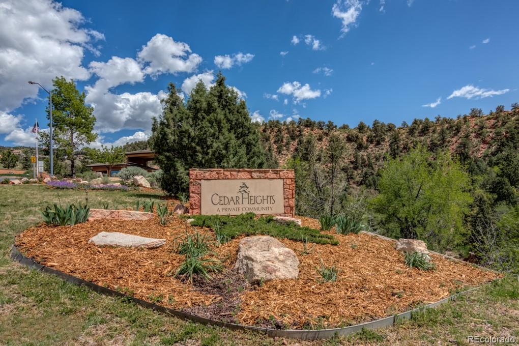 3455 Black Canyon Road Colorado Springs, CO 80904 - Photo 21 of 21 a sign board with view of a yard