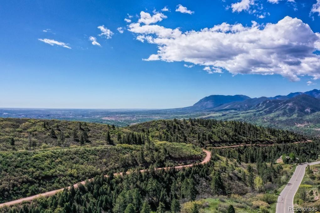 3455 Black Canyon Road Colorado Springs, CO 80904 - Photo 4 of 21 a view of a city with mountains in the background