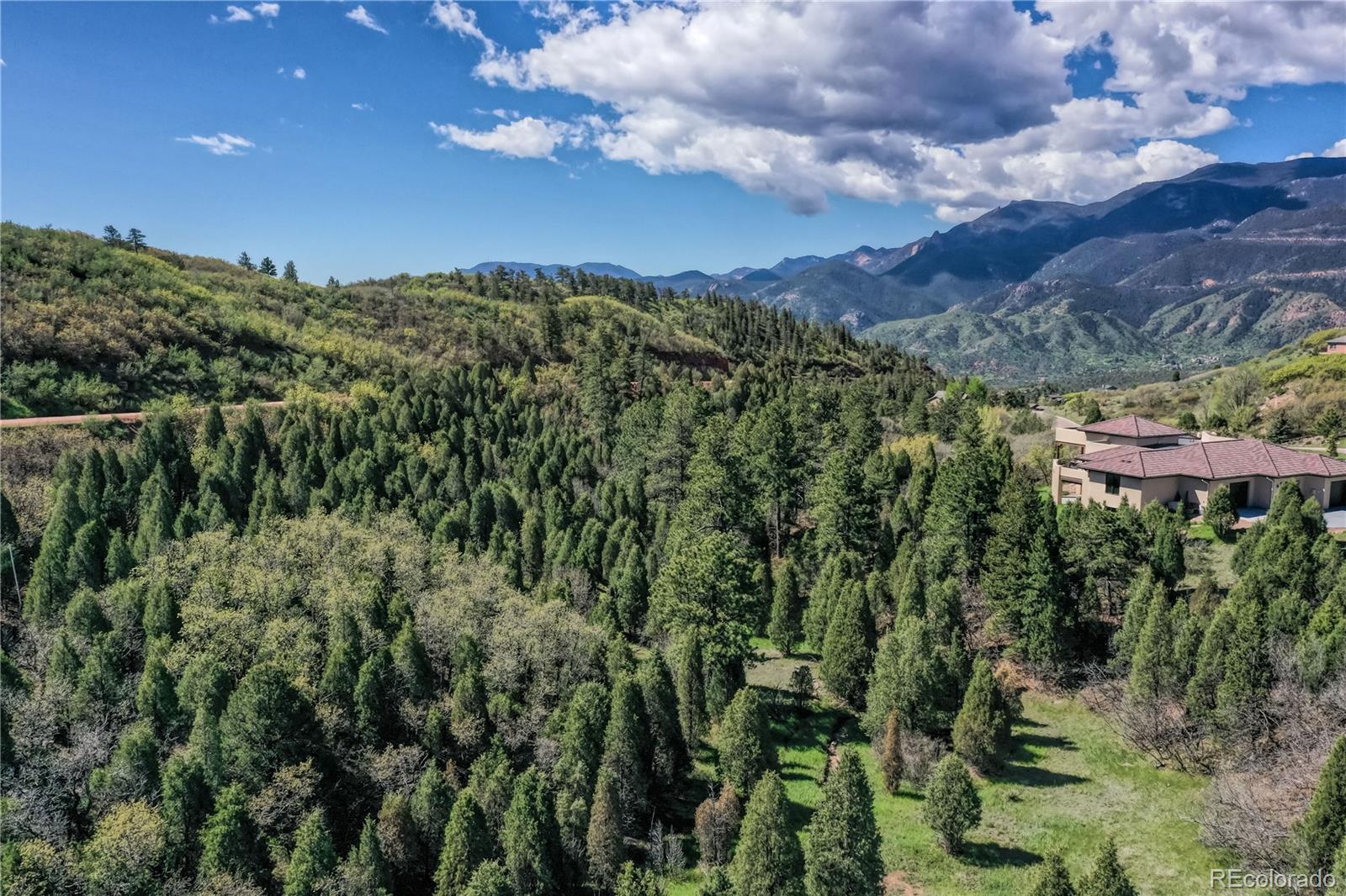 3455 Black Canyon Road Colorado Springs, CO 80904 - Photo 8 of 21 a view of a city with lush green forest