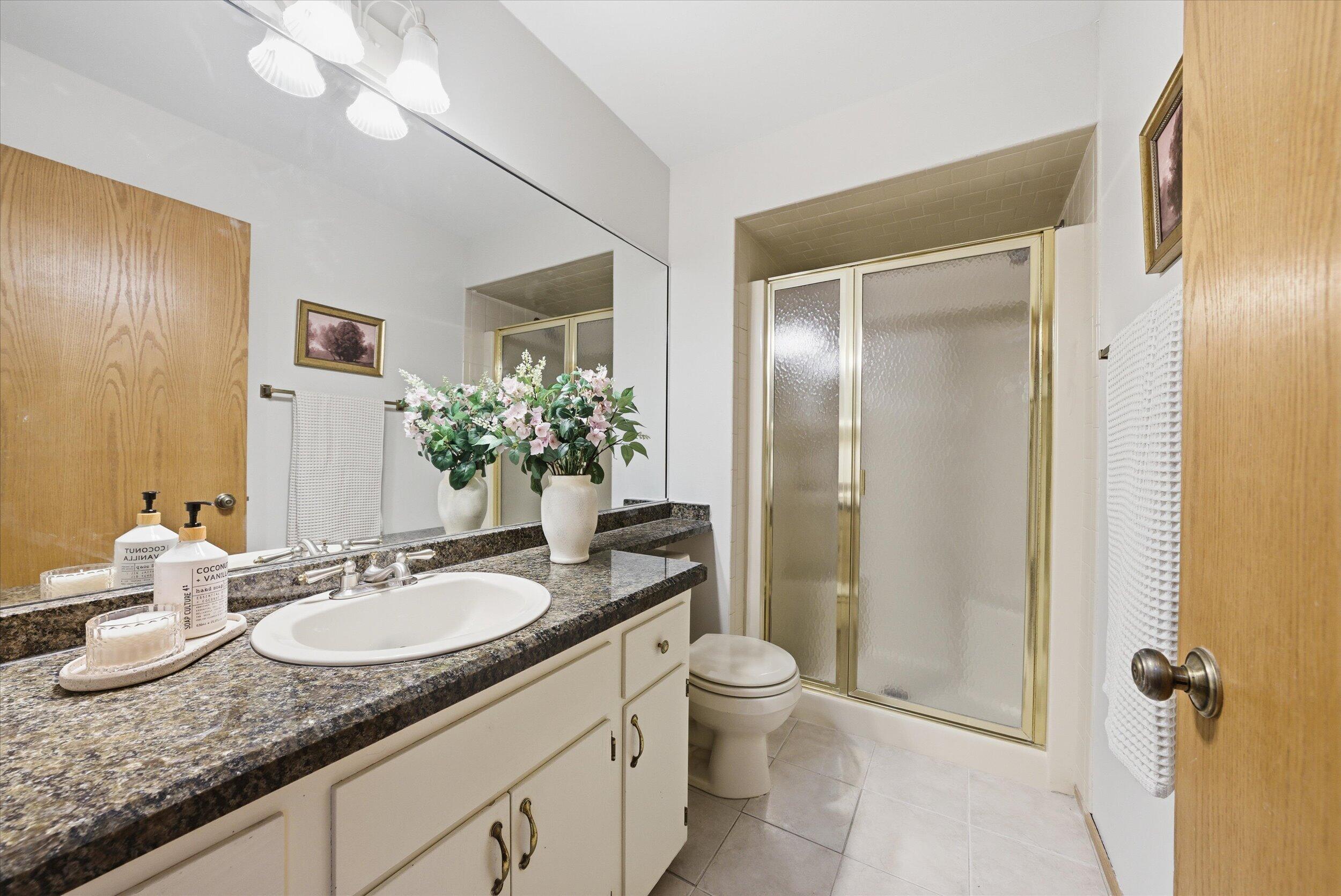 W178N9743 Riversbend Circle West Germantown, WI 53022 - Photo 18 of 40 Shared Bathroom w/walk-out shower