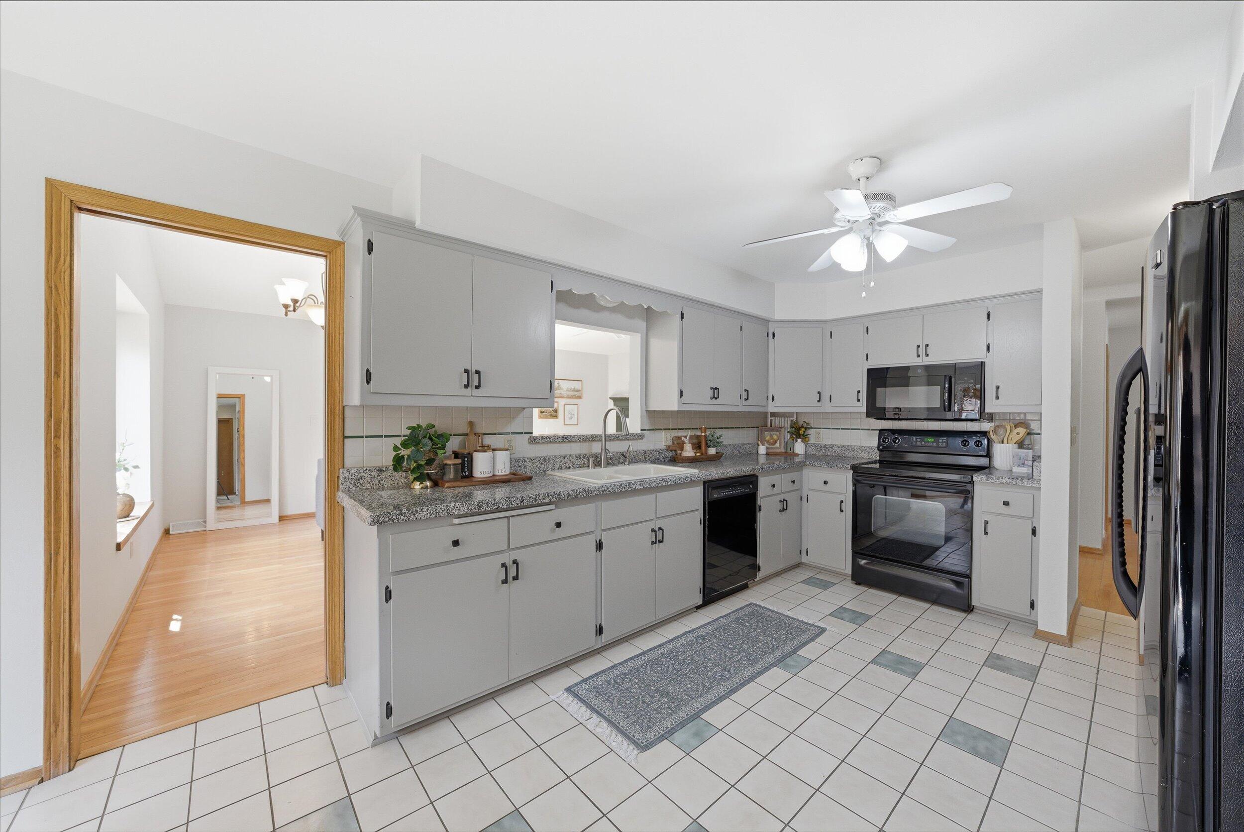 W178N9743 Riversbend Circle West Germantown, WI 53022 - Photo 8 of 42 Spacious Kitchen w/plenty of storage